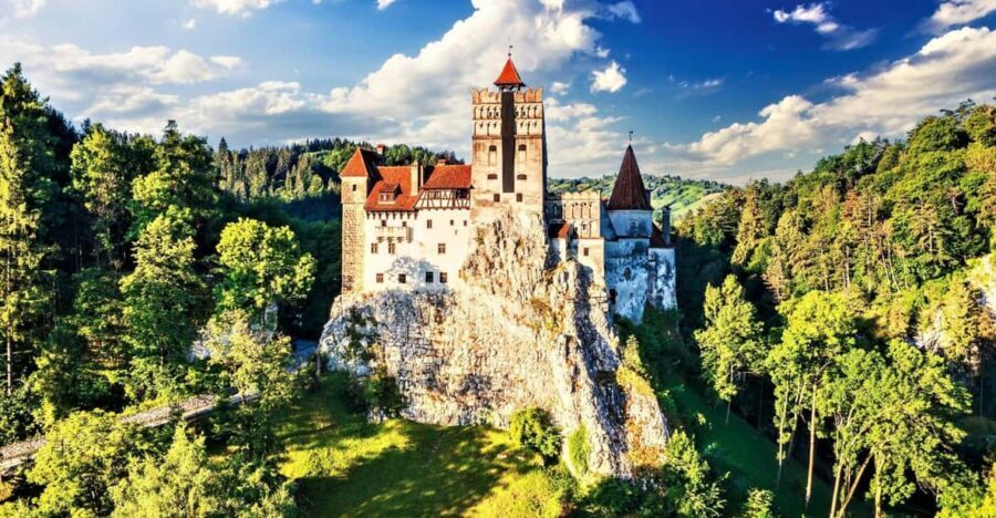 Bucharest: Peles Castle, Bran Castle, & Brasov Old Town Tour - Peleș Castle in Sinaia: royal rooms, weapons, and a practical Plan B