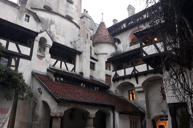 Dracula's Castle & Peles Palace Tour from Bucharest Including Brasov Old Town - Brasov Historical Center: Saxon walls and real city texture